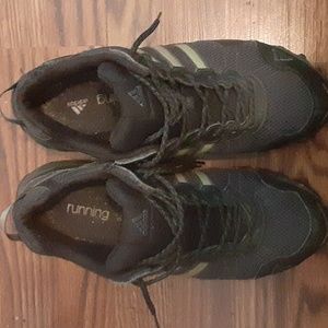 A pair of Adidas running shoes